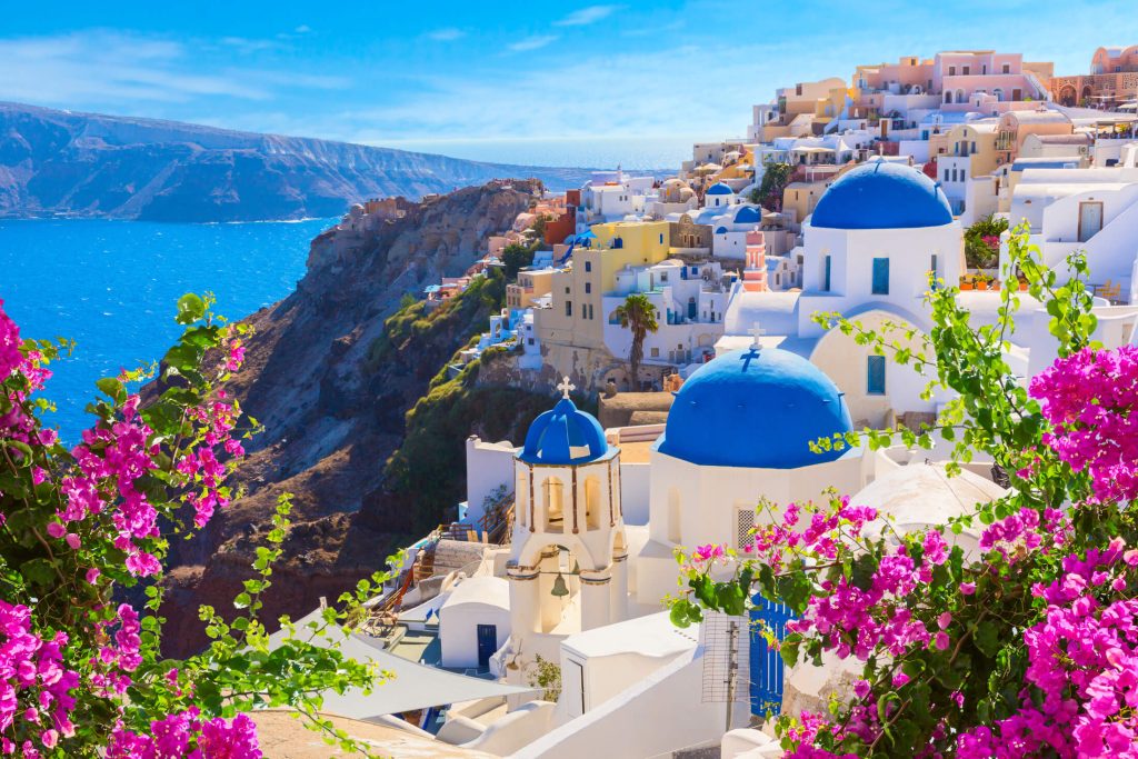 Blue roof buildings in Greece - Blue Ribbon Travel