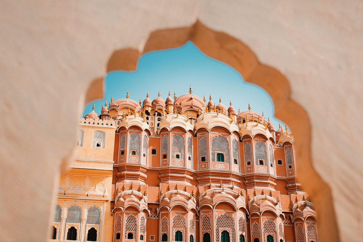 Inside of the Hawa Mahal or The palace of winds at Jaipur India. It is constructed of red and pink sandstone - Blue Ribbon Travel